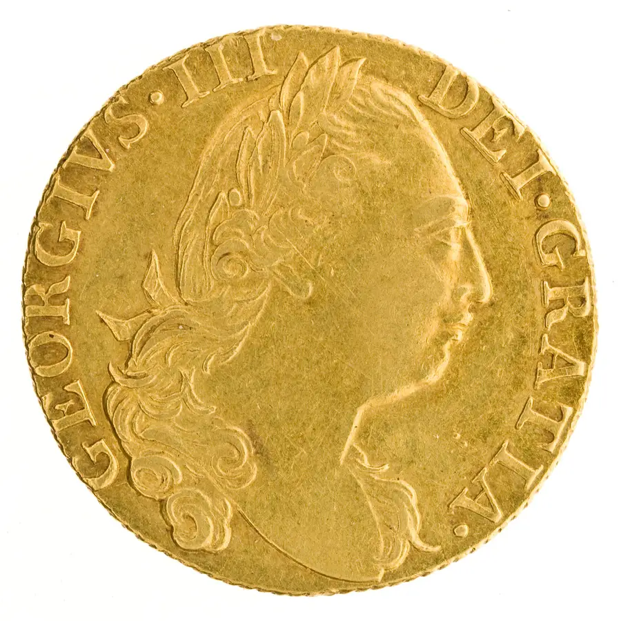 ジョージ3世のギニー金貨（1775年）の表面。右向きの国王の肖像